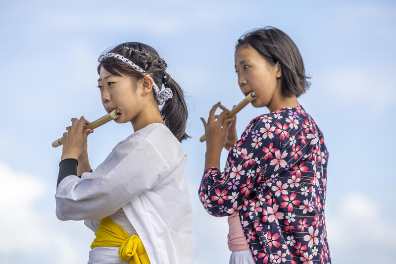Participants take part in the Ohara Hadaka Matsuri festival in Ohara, Chiba, Japan on September 23, 2025. The festival held on 23–24 September 2025 in the coastal town of Ohara, Chiba, is a centuries-old Shinto festival with origins in the Edo period. Traditionally, the event is a communal prayer for a bountiful harvest and a successful fishing season, reflecting the deep connection between coastal communities and the natural world. Participants, wearing only the traditional fundoshi loincloths, carry heavy mikoshi (portable shrines) through the streets in a lively procession, accompanied by chants, drums, and the energy of the crowd. The festival’s most dramatic moment is the Shiofumi ritual, in which the shrine-bearers wade into the Pacific Ocean, braving the waves as an act of devotion and purification, symbolically linking human effort to the forces of nature. The festival concludes with a lantern-lit parade through the streets and a farewell ceremony, creating a striking visual spectacle at sunset. As part of Japan’s broader tradition of hadaka matsuri or Naked Festivals, the Ohara Matsuri emphasizes endurance, faith, and community solidarity, while preserving regional identity and continuity from the Edo period to the present. Celebrated at the start of autumn, the timing also aligns with Japan’s seasonal cycles, marking the transition from the harvest season to the cooler months and highlighting a cultural rhythm that honors nature’s cycles, human labor, and the enduring spiritual connection between people and the sea. Matrix Images / Simon Bonny
