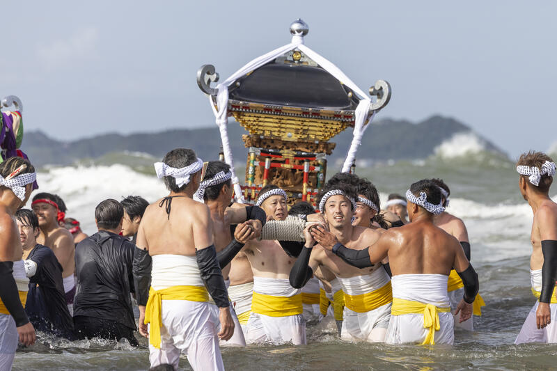 Participants take part in the Ohara Hadaka Matsuri festival in Ohara, Chiba, Japan on September 23, 2025. The festival held on 23–24 September 2025 in the coastal town of Ohara, Chiba, is a centuries-old Shinto festival with origins in the Edo period. Traditionally, the event is a communal prayer for a bountiful harvest and a successful fishing season, reflecting the deep connection between coastal communities and the natural world. Participants, wearing only the traditional fundoshi loincloths, carry heavy mikoshi (portable shrines) through the streets in a lively procession, accompanied by chants, drums, and the energy of the crowd. The festival’s most dramatic moment is the Shiofumi ritual, in which the shrine-bearers wade into the Pacific Ocean, braving the waves as an act of devotion and purification, symbolically linking human effort to the forces of nature. The festival concludes with a lantern-lit parade through the streets and a farewell ceremony, creating a striking visual spectacle at sunset. As part of Japan’s broader tradition of hadaka matsuri or Naked Festivals, the Ohara Matsuri emphasizes endurance, faith, and community solidarity, while preserving regional identity and continuity from the Edo period to the present. Celebrated at the start of autumn, the timing also aligns with Japan’s seasonal cycles, marking the transition from the harvest season to the cooler months and highlighting a cultural rhythm that honors nature’s cycles, human labor, and the enduring spiritual connection between people and the sea. Matrix Images / Simon Bonny