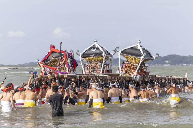 Participants take part in the Ohara Hadaka Matsuri festival in Ohara, Chiba, Japan on September 23, 2025. The festival held on 23–24 September 2025 in the coastal town of Ohara, Chiba, is a centuries-old Shinto festival with origins in the Edo period. Traditionally, the event is a communal prayer for a bountiful harvest and a successful fishing season, reflecting the deep connection between coastal communities and the natural world. Participants, wearing only the traditional fundoshi loincloths, carry heavy mikoshi (portable shrines) through the streets in a lively procession, accompanied by chants, drums, and the energy of the crowd. The festival’s most dramatic moment is the Shiofumi ritual, in which the shrine-bearers wade into the Pacific Ocean, braving the waves as an act of devotion and purification, symbolically linking human effort to the forces of nature. The festival concludes with a lantern-lit parade through the streets and a farewell ceremony, creating a striking visual spectacle at sunset. As part of Japan’s broader tradition of hadaka matsuri or Naked Festivals, the Ohara Matsuri emphasizes endurance, faith, and community solidarity, while preserving regional identity and continuity from the Edo period to the present. Celebrated at the start of autumn, the timing also aligns with Japan’s seasonal cycles, marking the transition from the harvest season to the cooler months and highlighting a cultural rhythm that honors nature’s cycles, human labor, and the enduring spiritual connection between people and the sea. Matrix Images / Simon Bonny