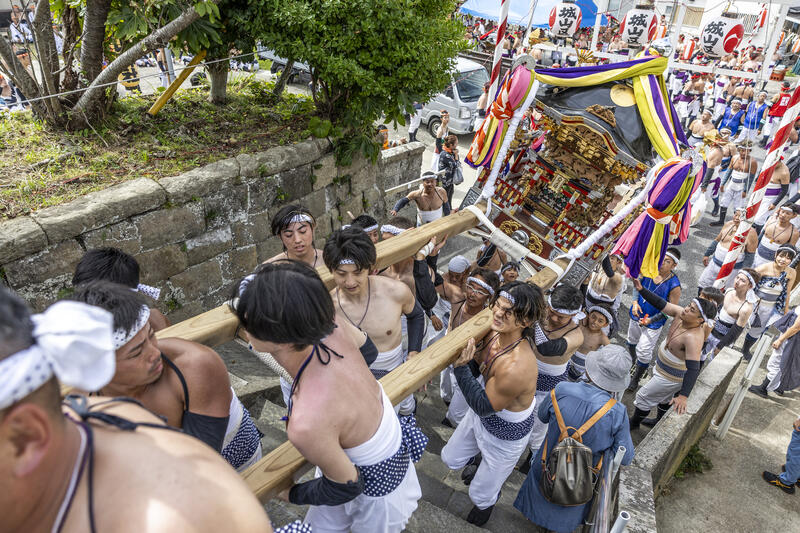 Participants take part in the Ohara Hadaka Matsuri festival in Ohara, Chiba, Japan on September 23, 2025. The festival held on 23–24 September 2025 in the coastal town of Ohara, Chiba, is a centuries-old Shinto festival with origins in the Edo period. Traditionally, the event is a communal prayer for a bountiful harvest and a successful fishing season, reflecting the deep connection between coastal communities and the natural world. Participants, wearing only the traditional fundoshi loincloths, carry heavy mikoshi (portable shrines) through the streets in a lively procession, accompanied by chants, drums, and the energy of the crowd. The festival’s most dramatic moment is the Shiofumi ritual, in which the shrine-bearers wade into the Pacific Ocean, braving the waves as an act of devotion and purification, symbolically linking human effort to the forces of nature. The festival concludes with a lantern-lit parade through the streets and a farewell ceremony, creating a striking visual spectacle at sunset. As part of Japan’s broader tradition of hadaka matsuri or Naked Festivals, the Ohara Matsuri emphasizes endurance, faith, and community solidarity, while preserving regional identity and continuity from the Edo period to the present. Celebrated at the start of autumn, the timing also aligns with Japan’s seasonal cycles, marking the transition from the harvest season to the cooler months and highlighting a cultural rhythm that honors nature’s cycles, human labor, and the enduring spiritual connection between people and the sea. Matrix Images / Simon Bonny