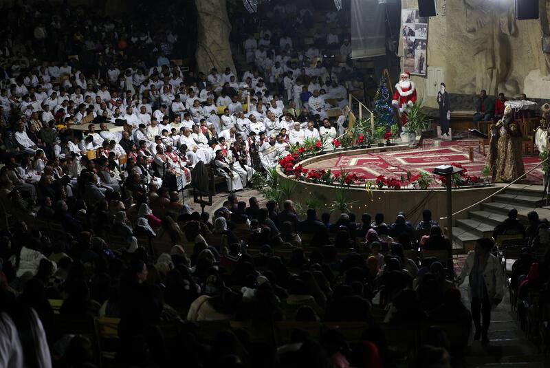 Coptic Orthodox Christians attend Christmas Eve mass in Cairo, Egypt