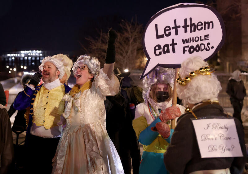 Protesters ahead of the screening of Melania documentary in Washington, DC, USA.