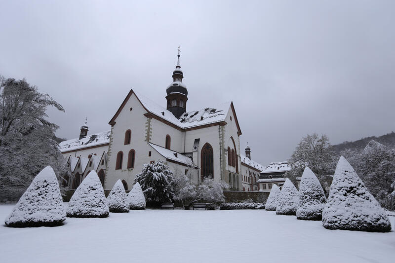 Winter storm blankets Eberbach Abbey in Germany's Rheingau