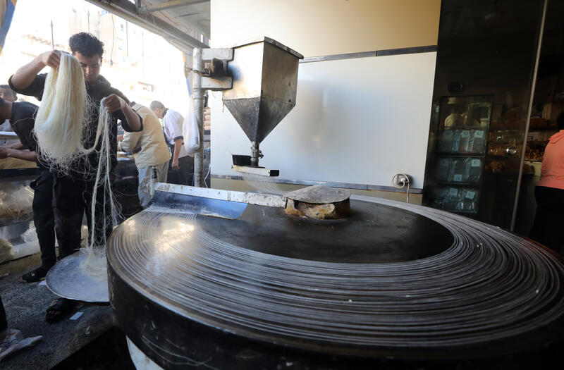 Bakers prepare dessert during Ramadan, Egypt