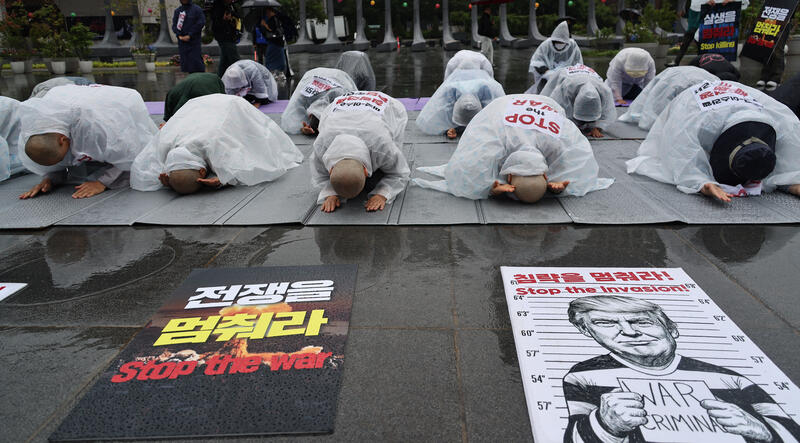 Buddhist monks, activists call for peace in the Middle East