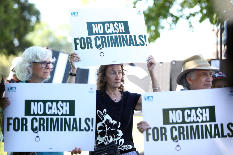 Demonstration against Trump's IRS settlement in Washington, DC