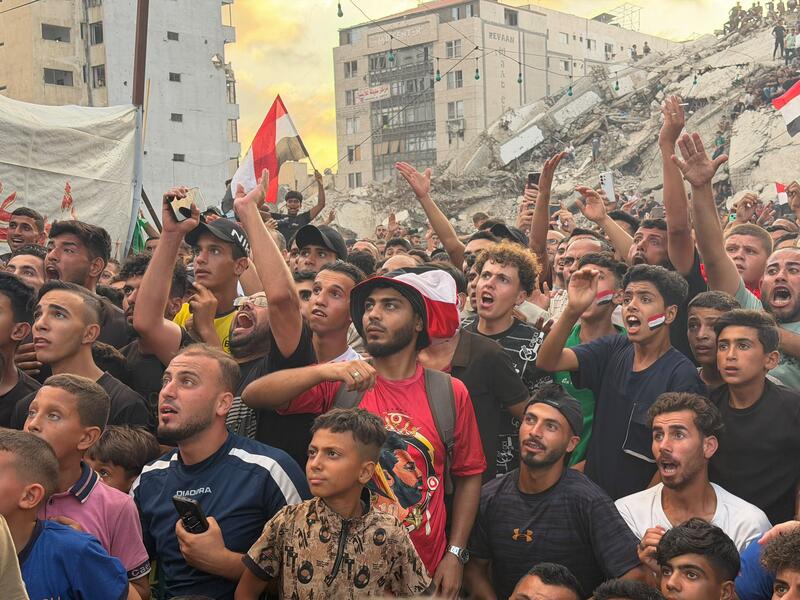 People watch FIFA world cup match Egypt v Argentina in Gaza City