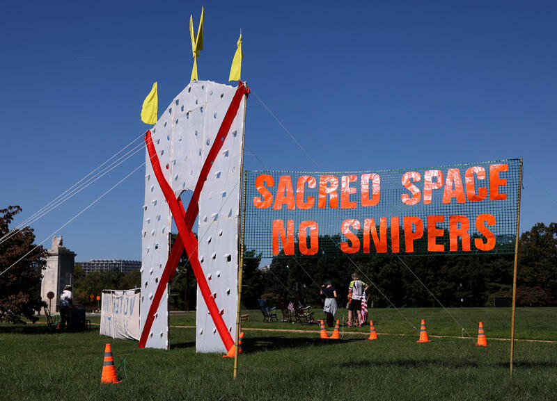 Activists protest against Trump's planned triumphal arch in Washington in Washington, DC, USA.